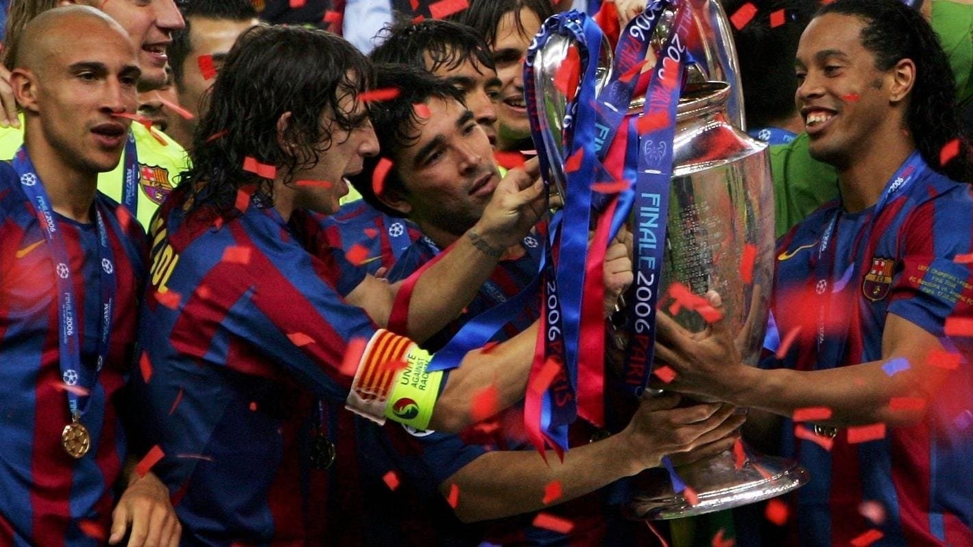 Puyol, Deco and Ronaldinho with the coveted UCL trophy