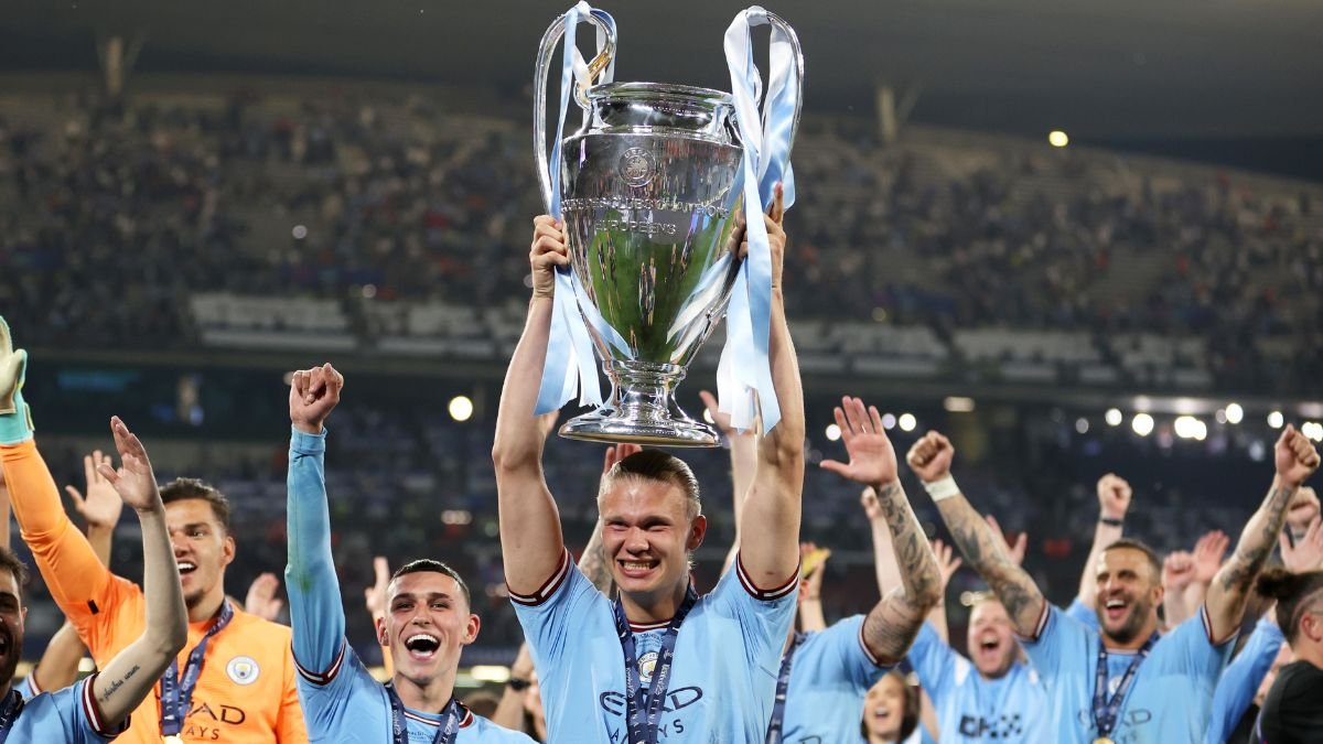 Haaland picks up the UCL trophy after Man City complete the treble
